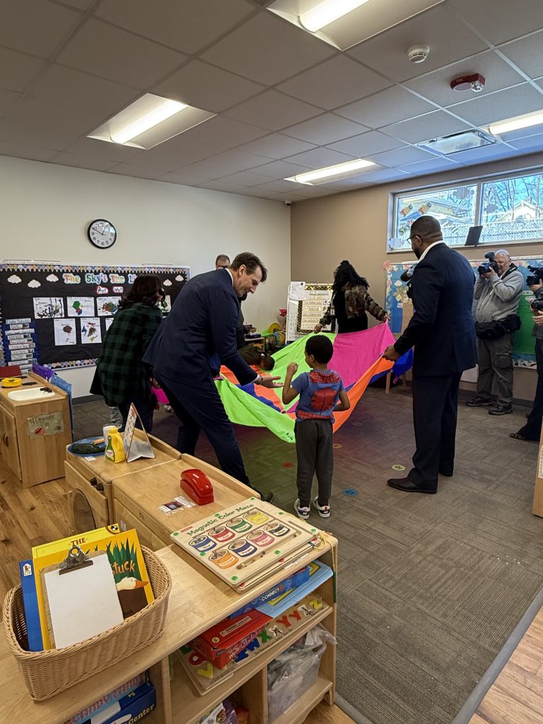Rep. Mrvan playing Head Start children